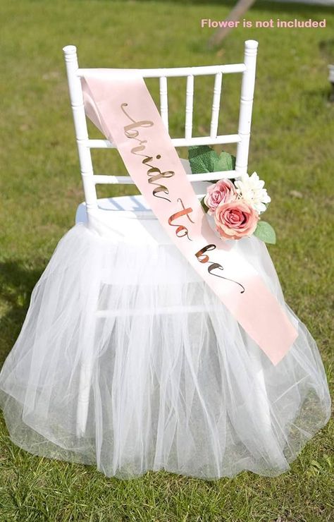 Amazon.com: UNIQOOO Chair Tulle Tutu Decoration for Bridal Shower | Birthday Party, Veil Fluffy Look in White Color - Great for Wedding, Baby Shower – Party Accessory Supplies, 20” x 20” - Fit Standard Chair : Home & Kitchen Bridal Shower Chair Decorations, Bridal Shower Bride Chair, Bridal Shower Chair, Bridal Chair, Bridal Shower Inspo, Bridal Shower Decorations Diy, Bridal Shower Planning, Bride To Be Sash, Bride Shower