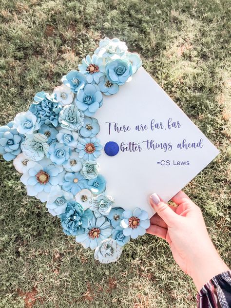 Blue And White Graduation Cap Ideas, Blue Cap Graduation Decoration, Grad Caps With Flowers, Graduation Cap Designs Floral, Blue Grad Cap Ideas, Graduation Cap Designs Blue, Flower Grad Cap, Highschool Graduation Cap, Floral Grad Cap