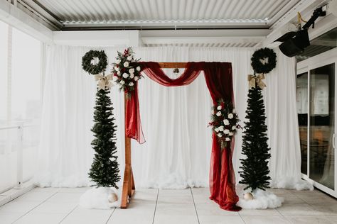 Christmas Wedding DIY Arch Christmas Wedding Balloon Arch, Winter Wedding Ceremony Arch, Christmas Wedding Arch Ceremony Backdrop, Christmas Wedding Alter, Christmas Wedding Arch Ideas, Christmas Wedding Arch, Christmas Wedding Backdrop, Winter Cabin Wedding, Christmas Wedding Diy