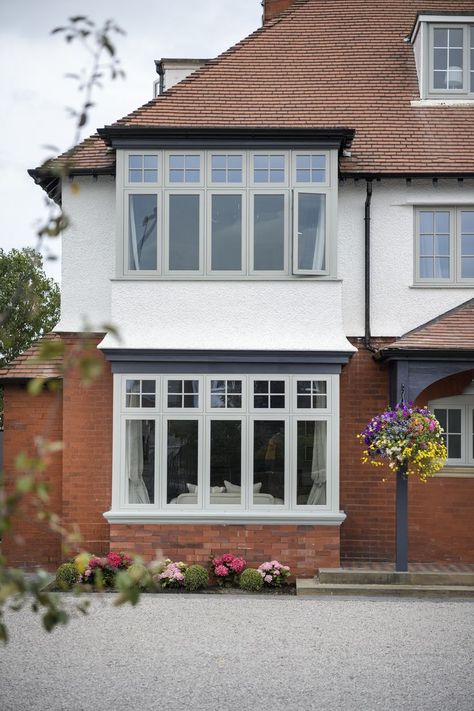 A detached traditional house with flush sash windows in grey 1930s House Exterior Uk, Edwardian House Exterior, 1930 House Renovation, 1930s House Extension, 1930s House Exterior, Kitchen Window Ideas, Front Window Design, Bay Window Exterior, Flush Casement Windows