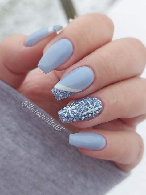 15 Short Winter Nail Ideas for 2023-2024 - thepinkgoose.com Winter Theme Nails Acrylic Short, Blue Nails White Snowflake, Dusty Blue Nails Acrylic Designs, Nails Design December, Christmas Nail Art Designs Blue, Winter Nails Grey Blue, December Nails Blue And Silver, Christmas Nails Snowflake Blue, Blue Short Christmas Nails