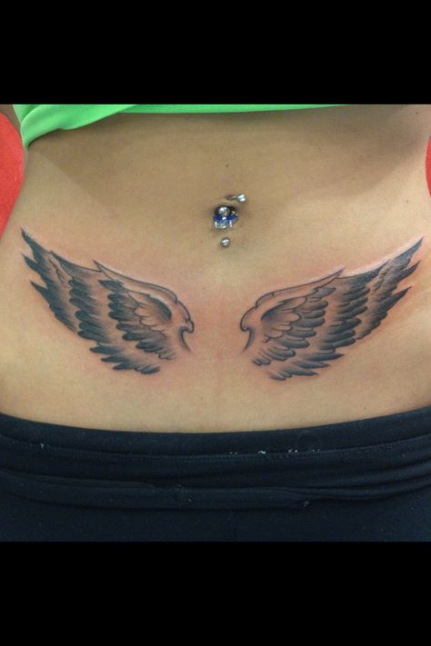 Finished result of my angel wings Angel Wing Tramp Stamp, Angel Wings Tattoo Man, Angel Wings Tramp Stamp, Wings Tramp Stamp, Angel Wings Tattoo On Back, Abdomen Tattoo, Belly Button Tattoo, Lower Stomach Tattoos, Wing Tattoos On Back