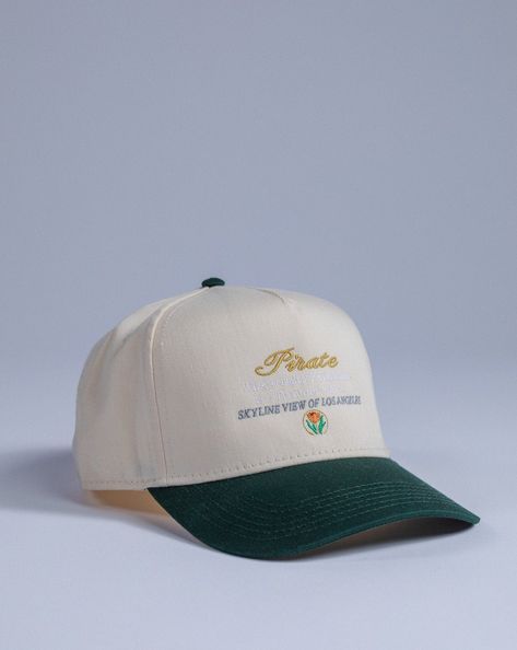 Pirate Skyline View Hat Size: Adjustable Snapback Cap Color: Cream/Green | Green Front Design Side PW Design Embroidery Stitch Count: 6,823 Embroidery Color: Gold, White, Grey, Orange, Red, Green, Cream Hats For Men Caps, Caps Design Ideas, Green Baseball Hat, Streetwear Hats, Hat Cream, Country Hats, Mens Hats, Fits Aesthetic, Embroidery Stitch