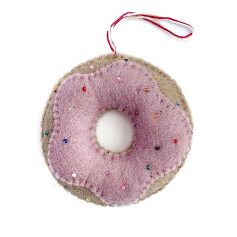 Satisfy your holiday craving with our NEW Donut Christmas Ornament! The pink strawberry icing and sprinkles look good enough to eat! Our Felt Wool Ornaments are handmade by artisans in Nepal, Asia using colorful sheep wool. Popular for their charming and durable designs, felt ornaments are perfect for the toughest toddler or curious critter. Dimensions: 3.5" tall x 3.5" wide Materials: Sheep wool Country of Origin: Nepal Ornaments 4 Orphans is a member of the Fair Trade Federation. Every purchas Donut Christmas, Donut Ornament, Wool Ornaments, Felted Ornaments, Strawberry Icing, Pink Ornaments, Dinosaur Ornament, Whimsical Christmas Decor, Cute Donuts