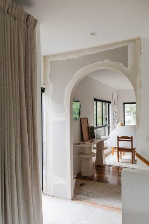 How To Make An Arched Doorway — Smor Home Adding Arches To Doorway Diy, Diy Curved Archway, Closing Off An Archway With Doors, Arch Living Room Wall, Arc Hallways, Adding An Archway, Curved Door Frame, How To Build An Arched Doorway, Arched Doorways Interior Diy