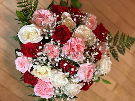 White, red and pink roses with baby’s breath #custom #created Roses And Carnation Bouquet Flower Arrangements, Red White Pink Flower Bouquet, Pink Red And White Wedding Theme, Red Pink Quince, Red Pink And White Wedding Flowers, Red Pink White Green Bouquet, Dusty Rose And Red Wedding, Red White And Pink Rose Bouquet, White Pink Red Wedding