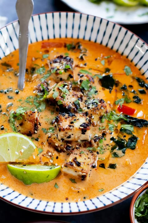 This Red Curry Peanut Soup with Sesame Crusted Tofu is made with a coconut broth, filled with veggies and finished with crispy tofu | ThisSavoryVegan.com #thissavoryvegan #tofurecipes #peanutsoup Soups With Tofu, Tofu In Soup Recipes, Tofu Soup Recipes, Spicy Tofu Soup Recipes, Vegan Soup With Tofu, Tofu Coconut Curry Soup, Tofu Coconut Curry, Tofu Soup, Peanut Soup