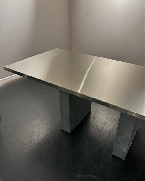 Vintage Habitat dining/ display table with stainless steel top and Zinc covered block legs 🤌🏾 We had the top of this table wrapped in stainless steel for the @refybeauty event and it turned out better than I imagined. This one is for rent or sale… #stainlesssteel #steeltable #bespoketable #vintagehabitat #habitatdiningtable Stainless Steel Table Kitchen, Dining Display, Steel Dining Table, Stainless Steel Table, Display Table, Steel Table, Habitat, For Rent, The Top