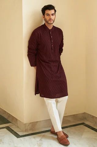 Oxblood kurta with chikankari embroidery. Paired with pant. Component: 2 Pattern: Embroidered Type Of Work: Chikankari Neckline: Mandarin Sleeve Type: Full Fabric: Chikankari Georgette Color: Maroon Other Details:  Weight (in gm): 800 Geometric motifs Front buttons Occasion: Puja - Aza Fashions Traditional Indian Mens Clothing, Kurta Designs Men's, Indian Wedding Clothes For Men, Wedding Kurta For Men, Boys Kurta Design, Kurta Pajama Men, Gents Kurta Design, Chikankari Kurta, Gents Kurta