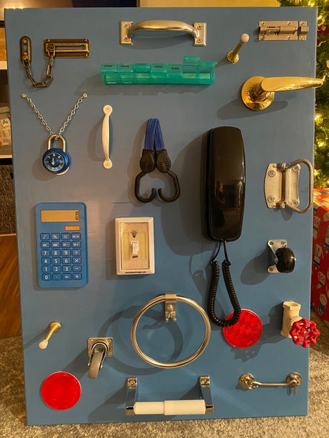 Homemade Toddler Busy Board with supplies from Menards, Amazon, & around the house. Lock And Key Busy Board, Toddler Busy Board Diy, Homemade Busy Board, Diy Busy Board Toddler, Diy Busy Board, Toddler Busy Board, Toddler Activity Board, Busy Board Baby, Montessori Diy