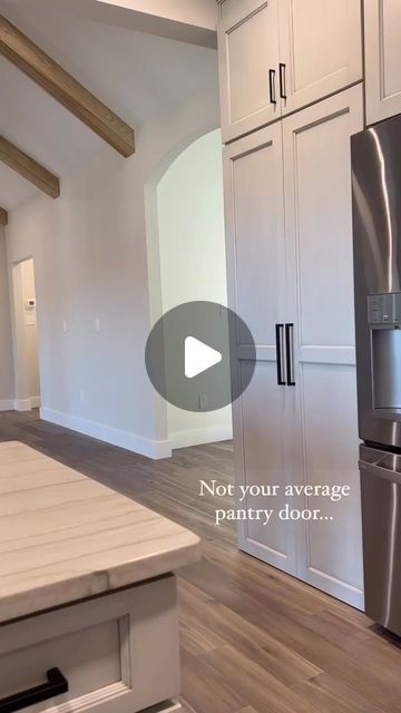 Interior Design & Home Decor on Instagram: "This hidden pantry closet is amazing🤩 @homebycardinal  “It even has a miniature grocery door connecting to the garage. Wouldn’t you love having this much storage?”  #hiddenpantry #pantry #customhome #homebuilder #homebuilding #newconstruction #kitchendesign  #homedesign" Grocery Door From Garage To Pantry, Kitchen With Hidden Pantry Floor Plan, Pantry Access From Garage, Garage Pantry Door, Hidden Prep Kitchen, Hidden Door Pantry, Small Hidden Pantry, Hidden Pantry Doors, Pantry Behind Fridge