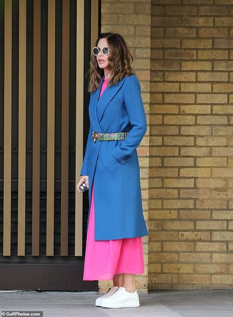 Trinny Woodall catches the eye in a hot pink maxi dress and blue coat outside the London ITV studios | Daily Mail Online Trinny Woodall, Pink And Blue Fashion, Pink And Blue Outfits For Women, Hot Pink Coat Outfit, Blue Pink Outfit, Pink And Blue Outfit, Hot Pink Maxi Dress, Color Outfits, Hot Pink Dress