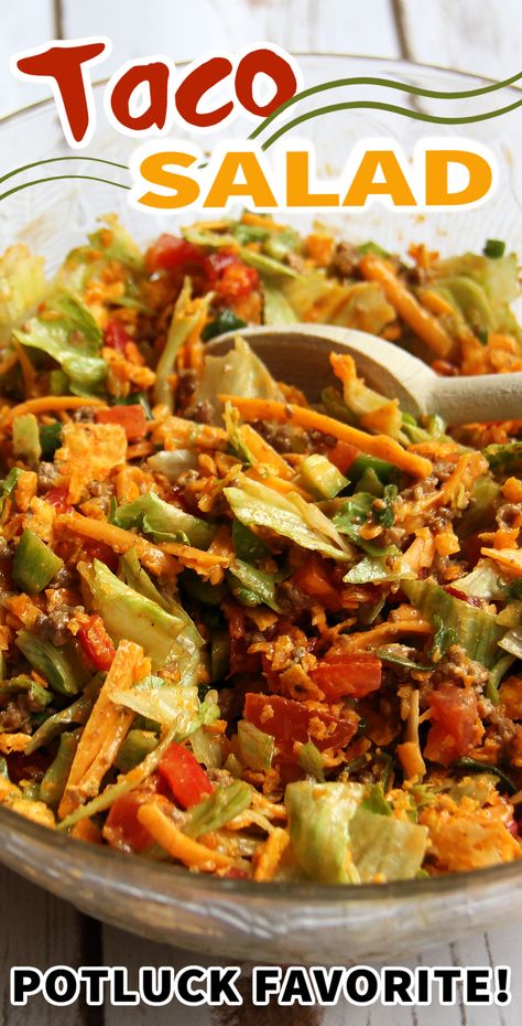 This TACO SALAD recipe is my go-to when I want a quick and easy meal. I love the spices and Doritos crunch! Plus, as evidence proved, it's a hit to take along to dinners and functions, it's the perfect camping and potluck salad! #tacosalad #salad #saladrecipe #camping #potlucksalad Western Taco Salad, Potluck Taco Salad, Taco Salad Meat Recipe, Cold Taco Salad With Doritos, Pioneer Woman Taco Salad, Party Taco Salad, Vegetarian Taco Salad Recipe, Crockpot Salad Recipes, Taco Salad Potluck