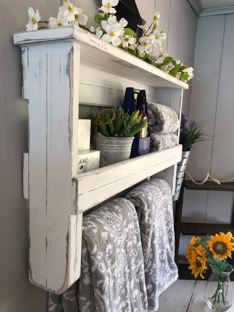 "Beautifully handcrafted of solid wood, this large towel bar shelf will compliment any decor. Handmade in our family owned workshop in Connecticut, this shelf pictured measures 28\" wide by 18\" high by 5\" deep. Features a solid galvanized towel bar that has been used instead of a wood dowel to prevent bowing or mold over time. This metal EMT bar is made to last and effortlessly accommodates two full size bath towels. There's plenty of space to beautifully store essentials from your bath, kitch Distressed Wood Wall, Shelf Farmhouse, Bar Shelf, Wood Creations, Wood Wall Decor, How To Distress Wood, Towel Bar, Decor Items, Home Wall Decor