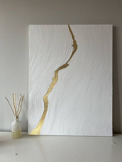 #acrylic #artofinstagram #abstract #color #artworks #artcollector #paintingart #artistsofinstagram #artsy #canvas #watercolorpainting #design #photography #digitalart #sketchbook #artforsale #artlover #oiloncanvas #canvaspainting #myart #contemporarypainting #kunst #homedecor White Textured Art With Gold, Large Painting Abstract, White And Gold Plaster Art, White On White Paintings Art, Drop Art Paint, White Spackle Painting, Plaster Leaf Art, Abstract Gold Art, White And Gold Canvas Art