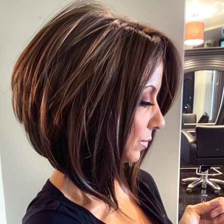 Voluminous Angled Bob with Layered Crown Stacked Bob Haircut With Layers, Brown Angled Bob, Inverted Angled Bob, Long Inverted Bob Hairstyles With Layers, Angled Layered Bob Medium, Short Angled Bob With Curtain Bangs, Stacked Brunette Bob, Long Short Bob Hairstyles, Angeles Bob Haircut