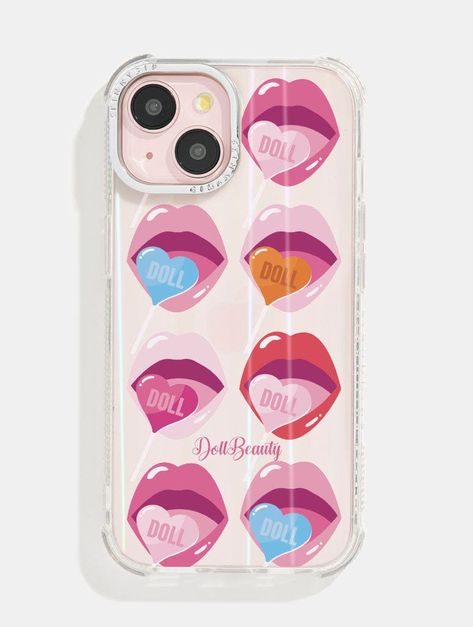 Blow kisses through your phone with this protective holo case made with Dolls Beauty!  This case is part of our print-to-order range. With print-to-order phone cases we print them as you purchase, which is a much more sustainable method of production – ultimately meaning we waste less plastic because less plastic is fantastic 😉 Add one of our Glass Screen Protectors on with this case and get it half price! (Discount automatically applied at checkout). Shock absorbent iPhone case  Holo base design Anti-slip dotted grip edges Anti-shock bumper corners Logo debossed in chrome camera ring for enhanced protection Raised edges give added protection to your screen face Scratch-resistant Drop tested Covers back and sides of phone Access to all ports with cutaway detailing Slim & lightweight desig Uk Makeup, Doll Beauty, Skinnydip London, London Brands, Base Design, Half Price, Makeup Brands, Glass Screen, Mini Case