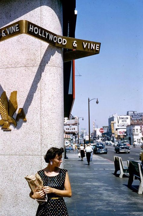 I’m wondering if this woman waiting on the corner of Hollywood and Vine had just booked a ticket at the American Airlines office that opened in 1955. MGM’s “Something of Value" starring Rock Hudson and Sidney Poitier at the Pantages Theatre came out in June of 1957. The corner now has a different sign alerting passersby that they’re at Hollywood and Vine, and it’s nice but there’s something classy and timeless about that golden ribbon above the woman’s head that I wish was still there. Angeles, Los Angeles, Hollywood And Vine, Photographie New York, 1950s Hollywood, Ca History, Los Angeles Hollywood, Foto Gif, California History