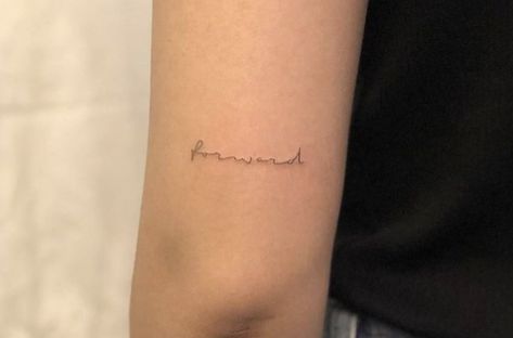 Tattoo Behind Elbow, Keep Moving Forward Tattoo, Forward Tattoo, Moving On Tattoos, Elbow Tattoo, Cursive Tattoos, Elbow Tattoos, Small Arm Tattoos, Delicate Tattoo