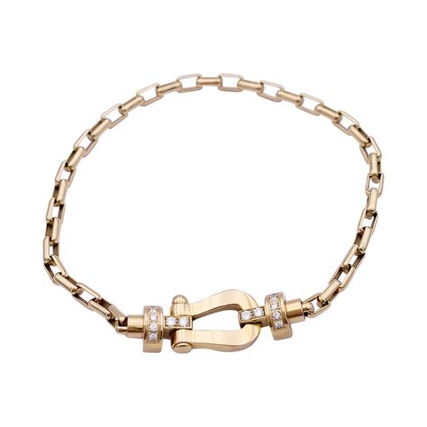 2,880€ A 18K yellow gold Fred bracelet, "Force 10" collection, the motif is partially set with brilliant cut diamonds. Fred Jewelry, Bracelet Fred Force 10, Shop In Paris, Paris Shopping, Brilliant Cut Diamond, Luxury Jewelry, Diamond Cuts, Gold Bracelet, Jewelry Bracelets