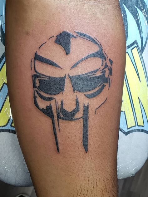 Mf Doom Tattoo Ideas, Mf Doom Tattoo Design, Mf Doom Mask Tattoo, Doom Tattoo Ideas, Outkast Tattoo, Tyler The Creator Tattoos Ideas, Mf Doom Tattoo, Doom Tattoo, Hiphop Tattoo