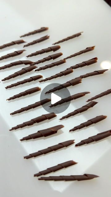 Christian Dewabrata on Instagram: "°Here’s another hands-free chocolate garnish tutorial. Making these kind of hands-free decorations is pretty much hard to make similar looking ones .but as long as we keep the same length and size it will look pretty similar one to another. What we need is just a paring knife, set it to around 20-30° from the surface and push with the same length and pressure. And do it on a semi-set tempered chocolate. Please try!°
•
•
•
•
•
•
•
•
#ChristianDs #CDS #cheftalk #chocolateshowpiece #showpiece #chocolategarnish #flower#chocolatefan #valrhonafrance #chocolatearrangement #pastry #coklat #chocolatefans 
#indonesiapastry #chocolate #garnish #indonesiapastryalliance #pastrychef #pastryart" Chocolate Garnish Decoration, Chocolate Garnish Ideas, Tempered Chocolate, Chocolate Showpiece, Chocolate Work, Chocolate Garnishes, Wedding Welcome Board, Pastry Art, Chocolate Decorations