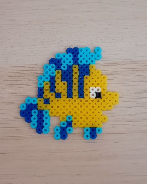 Perler Beads Disney Villains, Ocean Animal Perler Bead Patterns, Fuse Bead Patterns Disney, Fuse Beads Disney, Disney Melty Beads Patterns, Yellow Perler Beads Ideas, Turtle Fuse Beads, Disney Fuse Beads, Perler Bead Leaf