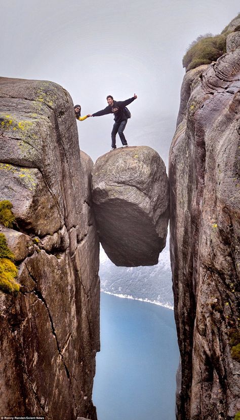 Despite the rain making its surface slippery the group of visitors in these photos ventured onto the boulder for some memorable snaps Norway Travel, Stavanger, World Photography, Elba, Travel Goals, Travel Couple, Travel Insurance, Tourist Destinations, Nature Travel