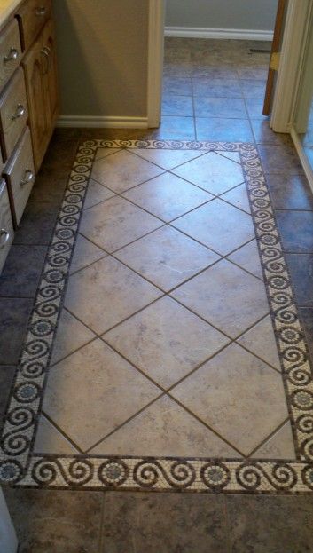 Beautiful but simple rug inlay Tile Rug Inlay Bathroom, Tile Rug Inlay, Entryway Tile Floor, Inlay Flooring, Entryway Tile, Foyer Flooring, Entryway Flooring, Rustic Bathroom Vanities, Floor Tile Design