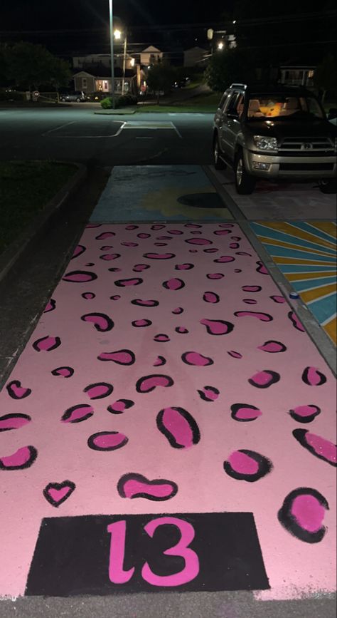 Cheetah Print Senior Parking Spot, Chalk Art Parking Spot, Painting Ideas On Traffic Cones, Cheetah Print Parking Spot, Barbie Parking Spot, Butterfly Senior Parking Spot, Paint Your Parking Spot Ideas, Preppy Parking Spot, Traffic Cone Decoration Ideas