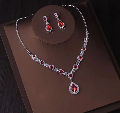 Holiday Special!!! Chic Silver Plated  Necklace & Earrings  Red Rhinestone Crystal Sets Stunning Necklace and Earrings Set Necklace & Earrings Modern Design Set / 287 Red Clear Color - Silver Plated Alloy Brand new  MSRP of this set is $89.00 Buy now before it's gone. You can't go wrong with this elegant set. The upscale craftsmanship and quality. Set is brand new with tag. Necklace With Red Stone, Prom Dress Accessories Jewelry, Red Prom Jewelry, Red And Silver Jewelry, Earrings Red, Red Jewellery Set, Necklace And Earrings, Red And Silver, Red And Gold Necklace