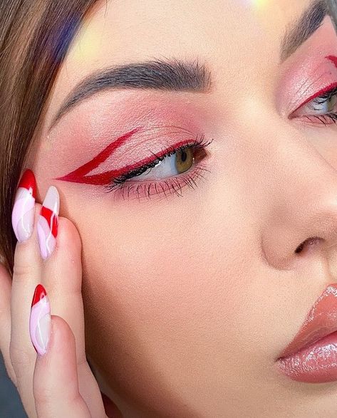 Make Up With Red Eyeliner, Red Eyeliner With Gems, Red Wing Eyeliner, Pink And Red Eyeliner, Fun Winged Eyeliner, Red Cat Eye Makeup, Red Liner Eye Makeup, Red And White Eyeshadow Looks, Red Graphic Liner Hooded Eyes