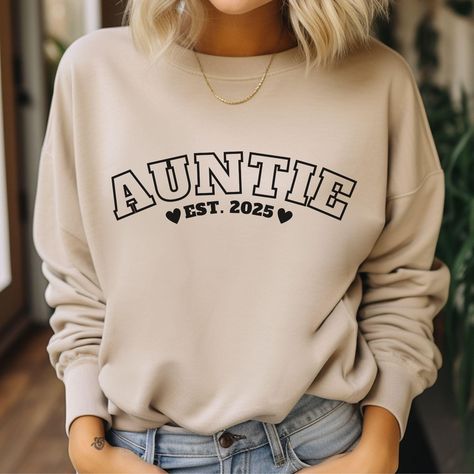 Auntie Sweatshirt, Personalized Auntie Sweatshirt with Date, Custom Aunt Sweater, Auntie Announcement, Gift for Aunt, Pregnancy Announcement by SixHeartsDesignCo on Etsy Auntie Announcement, Aunt Sweatshirt Ideas, Cool Aunt Sweaters, Aunt Sweatshirts, Aunt Hoodies Sweatshirts, Auntie Sweater, Aunt Pregnancy Announcement, Aunt Sweater, Auntie Sweatshirt