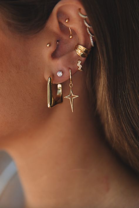 The XL Star Huggie – Jay Nicole Designs Gold Earrings Up The Ear, Mixed Metal Earring Stack, Ear Styling Ideas, Ear Piercing Styling, Ear Piercing Curation, Cool Ear Piercings, Pretty Ear Piercings, Cute Ear Piercings, Stacked Earrings