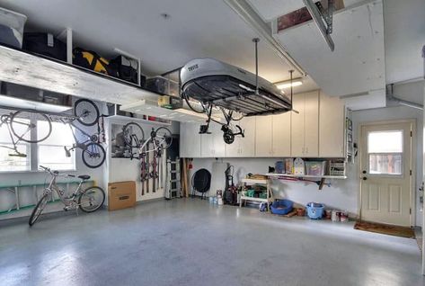 Garage with bike storage and overhead racks Garage Storage Ideas Cabinets, Garage Storage Ceiling, Storage Ideas Cabinets, Garage Organization Cheap, Adjustable Wall Shelving, Bike Storage Home, Shelving Diy, Garage Apartment Floor Plans, Diy Home Updates