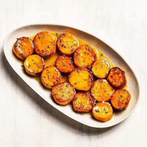 Honey-Garlic Melting Sweet Potatoes | America's Test Kitchen Recipe Sweet Potatoes For A Crowd, Melting Sweet Potatoes, Potatoes For A Crowd, Melting Potatoes, Fondant Potatoes, Vegetarian Casserole, Pan Sauce, Cooking App, Thanksgiving 2024