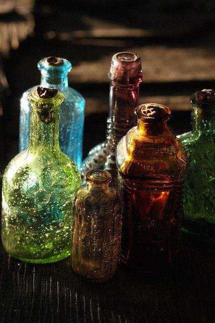 Magickal Ritual Sacred Tools:  Colored glass potion bottles. Decor Marin, Vibeke Design, Colored Glass Bottles, Witch Cottage, Bohemian Aesthetic, Glas Art, Altered Bottles, Deco Boheme, Antique Bottles