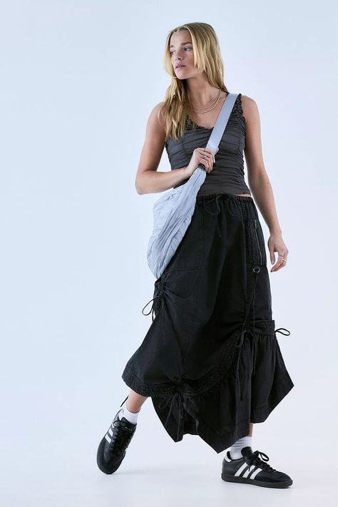 Add some grunge styling to your skirt collection with this parachute maxi. Cut from a woven adventure-ready cotton fabrication Ft. a regular elasticated waist with toggle fastenings, zip-up pockets and a balloon fit through the body. Complete with a maxi length asymmetric hem and adjustable ruched panels in side seams with toggles to secure. UO exclusive. Asymmetrical Maxi Skirt, Tokyo Style, Skirt Collection, Tokyo Fashion, Mesh Skirt, Line Shopping, Green Hair, Black Fits, Asymmetric Hem