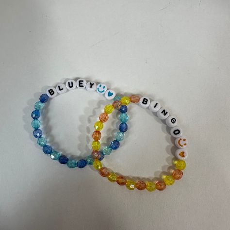 This Is A Handmade Cute Bluey And Bingo Bracelet! This Bracelet Would Be Perfect For Siblings! This Bracelet Is Made Using Elastic String So It Can Fit Almost Any Size Kids' Wrist. This Bracelet Would Be Perfect To Wear With Anything At Anytime! Bundles And Reasonable Offers Welcome! Bluey, Bingo, Matching, Sisters, Matching Bracelets, Cartoon, Bluey Cartoon, Cartoon Show, Cute, Cutesy, Girly, Shiny, Iridescent, Colorful, Multicolored, Amazing, Spring, Summer, Winter, Fall, Every Day, Casual, Si Bluey And Bingo Bracelets, Bluey Gift Ideas, Cartoon Bracelet Ideas, Bluey Bracelet Ideas, Bluey Bracelets, Silly Bracelets, Matching Bracelet Ideas, Diy Bluey, Kandi Jewelry