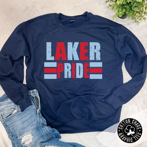 Our brand new school spirit sweatshirt Show your school spirit with this navy crewneck sweatshirt! Accented with a red and Columbia blue design, this unique garment is sure to turn heads and have your friends shouting 'Go Lakers!' Features: multi color design on navy crewneck sweatshirt design is DTG pressed unisex fit runs true to size Brand: Gildan ﻿Use code: PICKUP at checkout for local pickup Pta Board, Crewneck Sweatshirt Design, Staff Shirts, School Spirit Shirts Designs, Cheerleader Gifts, School Swag, School Shirt Designs, Cricket Projects, School Spirit Wear