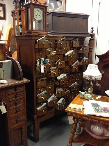 10 Fun Uses for Old Card Catalogs | Mental Floss I LOVE mine!  Would love to have a few more. Repurposed Card Catalog, Library Card Catalog Cabinet, Card Catalog Cabinet, Library Card Catalog, Haberdashery Shop, Library Inspiration, Old Library, Card Catalog, Vintage Library