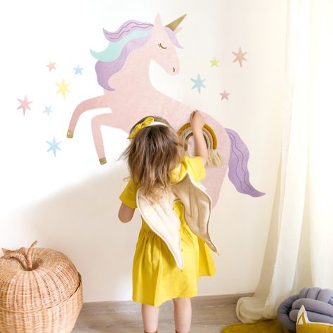 Add a touch of whimsy and adventure to your girl's room or baby girl's nursery with our Watercolor Unicorn Wall Sticker! Featuring a beautiful watercolor unicorn surrounded by stars, this peel-and-stick wall decor is both fun and cute. Plus, it's repositionable - perfect for risk-takers who like to change up their decor with ease! #wallart #walldecor #wallsticker #watercolors #watercolorart #watercolorillustration #watercolorunicorn #watercolorwallart #watercolorwallmural #babygırl #babygırl ... Unicorn Wall Mural, Playroom Wall Decals, Unicorn Wall Decal, Girls Wall Stickers, Unicorn Room Decor, Nature Decal, Unicorn Painting, Girls Room Wall Decor, Chalkboard Decal