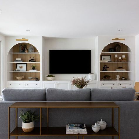 Bright and airy living room design Living Room Tv Not Focal Point, Built In Media Wall Basement, Amber Interiors Tv Room, Media Room Cabinet Ideas, Recessed Tv Cabinet, Media Wall Built In Ideas, Large Tv Built In, Media Console Built In, Built In Shelves Tv Wall