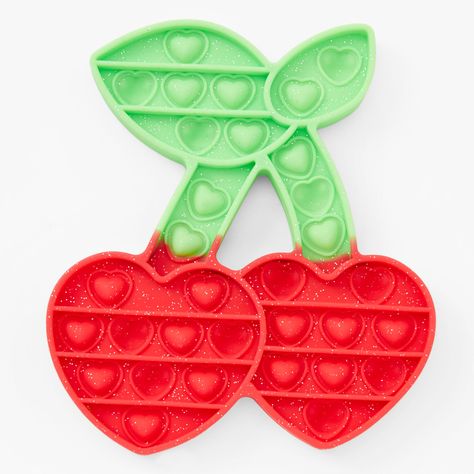 You asked, and now you shall receive. This year's biggest trend: fidget toys, are now available at Claire's! Take some time to mellow out and decompress with this cherry shaped & scented fidget toy. Push in, pop out, this silicone treat is the perfect toy for endless fidget sessions. Easy to use and with the ability to return to original form, simply flip the fidget toy over and restart your relaxation after all buttons are popped. So satisfying! Follow the trend, occupy your hands, and pop pop Figet Toys, Quad Roller Skates, Cool Fidget Toys, Pop Pop, So Satisfying, Barbie Birthday, Fashionable Jewelry, Fidget Toy, Pop Out