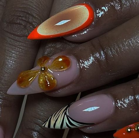 𝓒𝓱𝔂𝓷𝓪 𝓖𝓵𝓪𝓭 ₊˚⊹♡ on Instagram: "Orange mix match set for Kayla 🧡 recreation of a set by @thelatech 
•
•
•
Products: 
@apresnailofficial medium stiletto sculpted tips , “vintage carnation” base & gel colours
@southtxnailsupply gel glue , sculpt & 12mm liner code : CHYNA10 for $$ off 
@airtex_official airbrush system 
@nailzbydevshop baddest black liner gel 
•
•
#gelx #ocnailtech #lanailtech #explore #explorepage #nailinspo #naildesign #summernails #floralnails #3dnails #auranails #orangenails" Medium Stiletto, La Nails, Gel Glue, Black Liner, Orange Nails, Floral Nails, 3d Nails, Gel Color, Mix Match