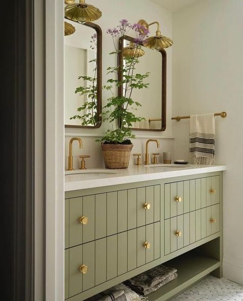 Vivir Design on Instagram: "We truly cannot get enough of the warmth and palette in this @tiffanyleighdesign project. Love the sage green, and of course… we can never resist a good wine room! We hope everyone had a lovely Monday day.  [Photos: @patrickbiller] [Styling: @_meandmo_] [Build: @kingsgateconstruction] . . . . . . . . . . . . .  #smmakelifebeautiful #sodomino #kitchendesign #homewithrue #mysmphome #idcoathome #dailydecordose #design123 #currentdesignsituation #apartmenttherapy #houseenvy #mydomaine #ambularinteriorsaintgotnothingonme #inmydomaine #lonnyliving #designsponge #mycovetedhome #kitchengoals #ruedaily #howvouhome #thenewsouthern #finditstvleit #maketimefordesign #howwedwell #simplystyleyourspace #vogueliving #kitchencrush #mixedfinishes #kitchenlove #flashesofdelight" Save Green Bathroom, Green And Cream Bathroom, Sage Bathroom Ideas, Green Bathroom Cabinets, Light Green Bathroom, Sage Green Bathroom Ideas, Green Beadboard, Sage Bathroom, Greige Bathroom