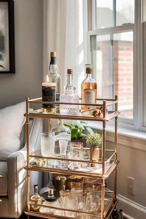 Bar carts are a great alternative to stationary wet and dry bars. These vintage bar cart styles will bring a classy, fun look to your home. Vintage Bar Cart Styling, Bar Cart Decor Ideas, Globe Bar, Modern Bar Cart, Home Bar Areas, Rolling Bar Cart, Glass Bar Cart, Nautical Theme Decor, Bar Cart Styling