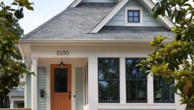 Woman Downsizes to 557 Sq. Ft. Tiny Cottage Tumbleweed Tiny Homes, Tiny House Company, Orange Door, Tiny House Plan, Tiny Cottage, Casas Coloniales, Casa Exterior, Tiny House Movement, Cabins And Cottages