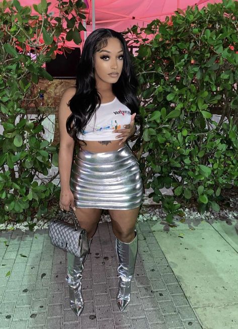 Metallic Shorts Outfit Black Women, Telly Party, Birthday Outfit Ideas With Sneakers, Chrome Skirt Outfit, Black And Silver Baddie Outfit, Sliver Outfit Black Women, Silver Boots Outfit Baddie, Silver Bubble Skirt Outfit, Silver Chrome Outfit Black Women