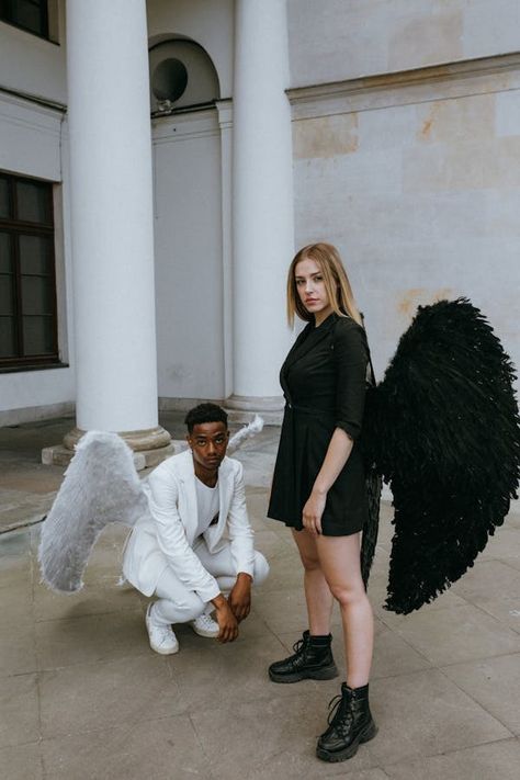 A Man and Woman Wearing Angel Costumes · Free Stock Photo Angel Man Costume, Angel Costumes, Angel Man, Angel Costume, Black Wings, Angel And Devil, City Of Angels, Dark Angel, Mens Costumes